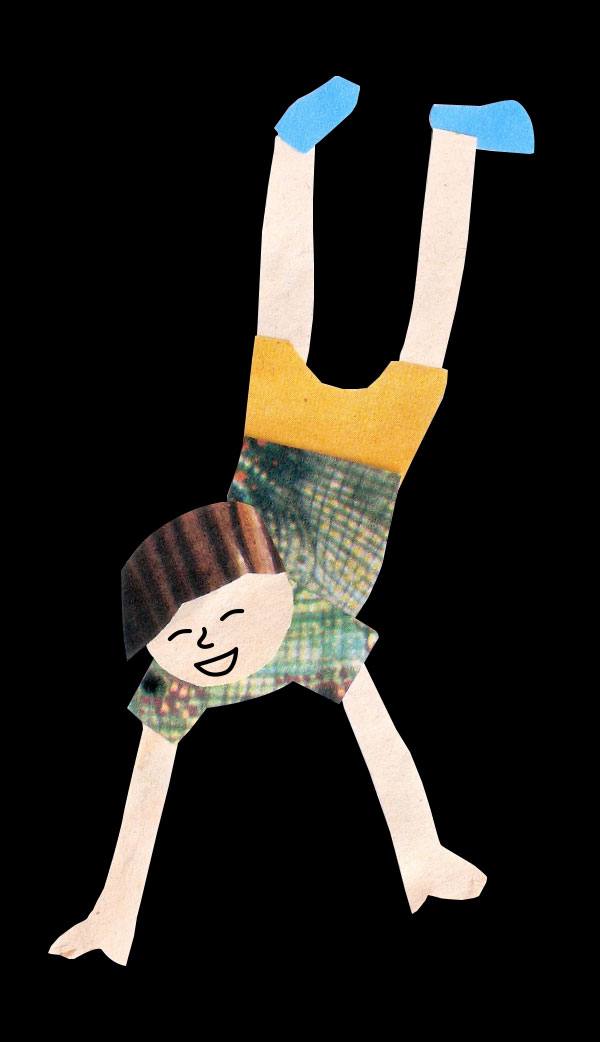 A child doing a handstand, built from cut paper